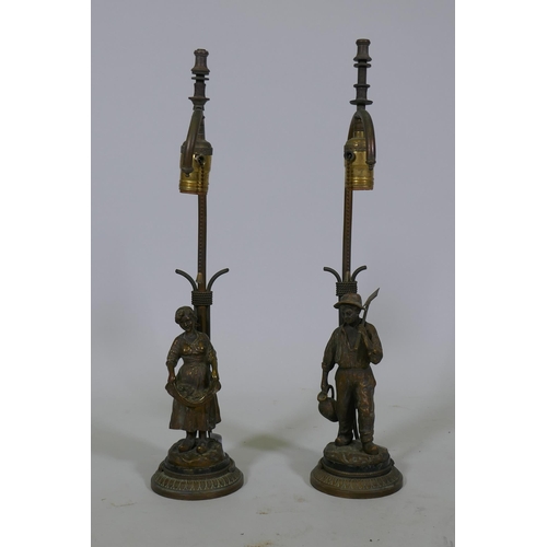 224 - A pair of French gilt bronze, figural gas table lamps, Dutch boy and girl after J. D'Aste, converted... 