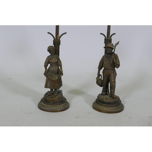 224 - A pair of French gilt bronze, figural gas table lamps, Dutch boy and girl after J. D'Aste, converted... 