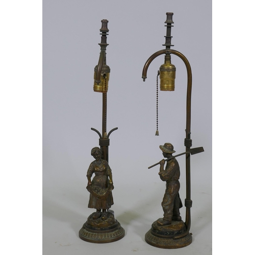 224 - A pair of French gilt bronze, figural gas table lamps, Dutch boy and girl after J. D'Aste, converted... 