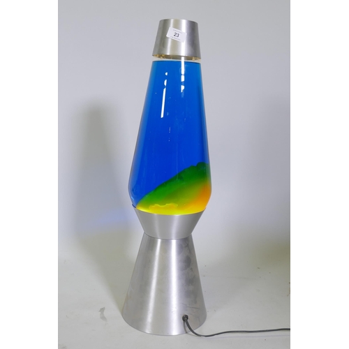 23 - A large Astro type lava lamp, 68cm high