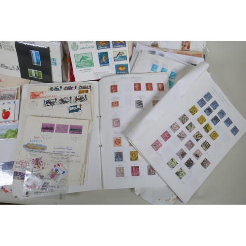 236 - A quantity of world stamps, first day covers and albums