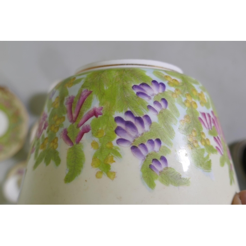 241 - An antique Staffordshire part tea service decorated with foxgloves of various colours, largest 24cm ... 