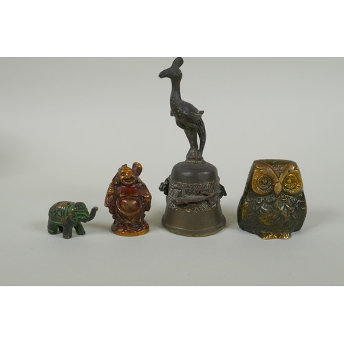 245 - An antique Oriental bronze bell, a small bronze jolly Buddha and two bronze animals, largest 12cm hi... 