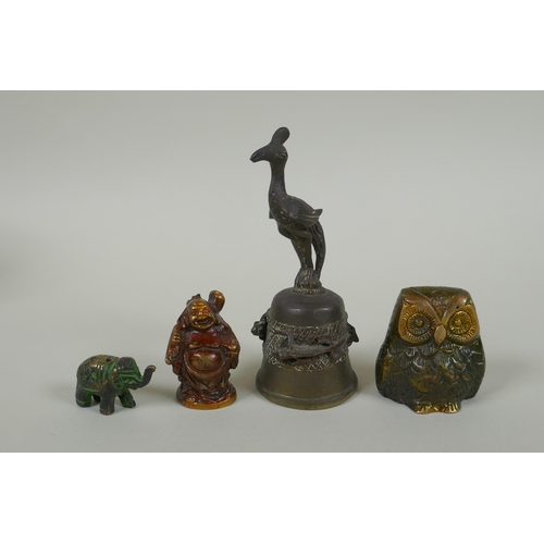 245 - An antique Oriental bronze bell, a small bronze jolly Buddha and two bronze animals, largest 12cm hi... 