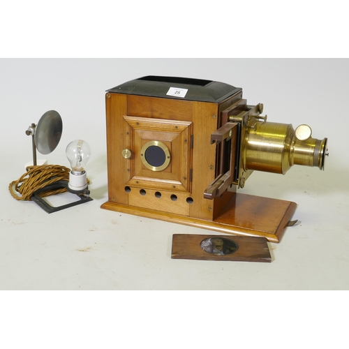 25 - A Victorian Eclipse magic lantern, by R.R. Beard, mahogany cased with brass fittings, and a Quickset... 