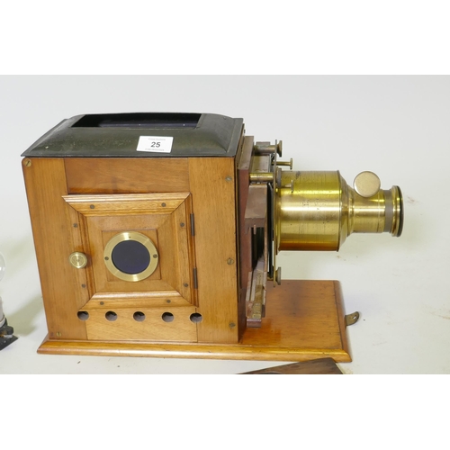 25 - A Victorian Eclipse magic lantern, by R.R. Beard, mahogany cased with brass fittings, and a Quickset... 