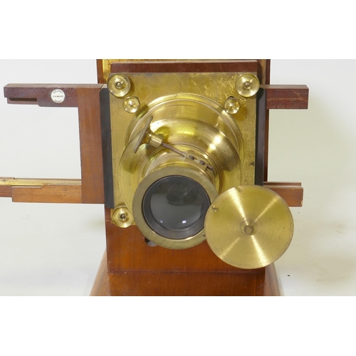 25 - A Victorian Eclipse magic lantern, by R.R. Beard, mahogany cased with brass fittings, and a Quickset... 