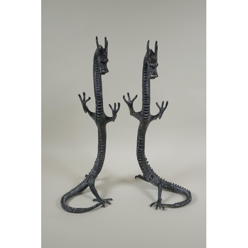 250 - A pair of bronzed metal dragons, 40cm high