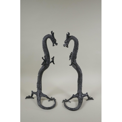 250 - A pair of bronzed metal dragons, 40cm high