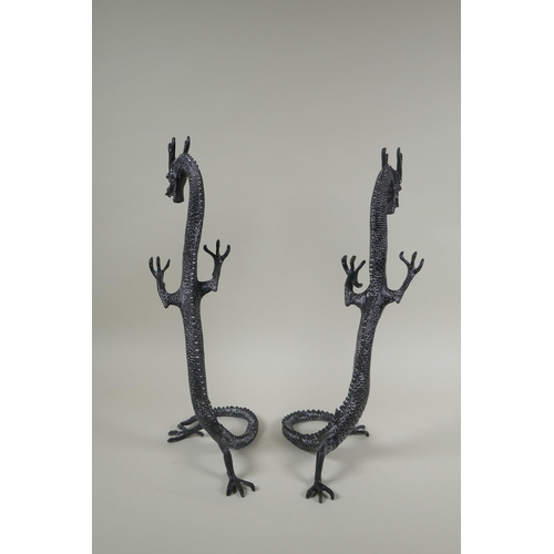 250 - A pair of bronzed metal dragons, 40cm high