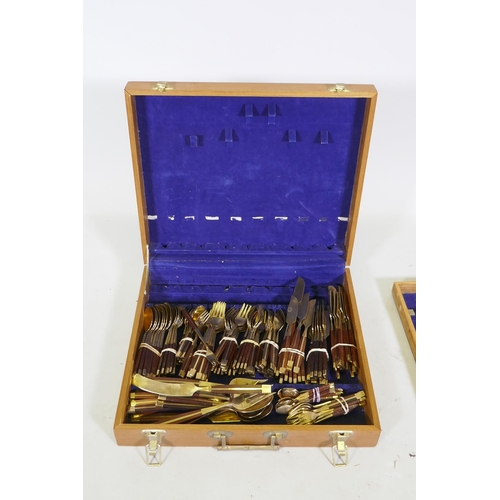 257 - A canteen of brass and rosewood cutlery, probably Thai or Malaysian, 12 place settings