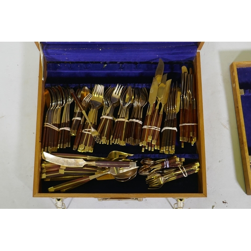 257 - A canteen of brass and rosewood cutlery, probably Thai or Malaysian, 12 place settings