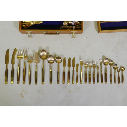 257 - A canteen of brass and rosewood cutlery, probably Thai or Malaysian, 12 place settings