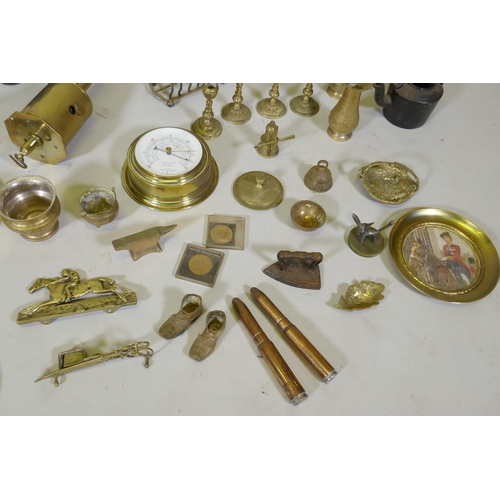 261 - A large collection of vintage brass, bronze, copper and other metalwares, including trays, candlesti... 