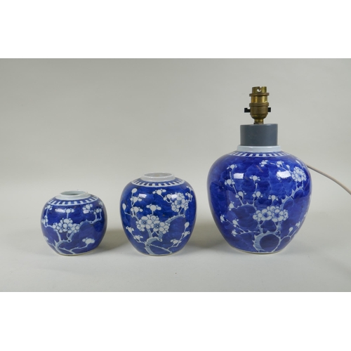 270 - Three Chinese blue and white porcelain graduated ginger jars, decorated with prunus blossom on a cra... 