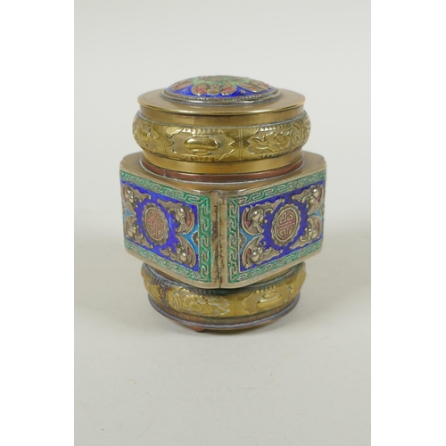 271 - A Chinese enamelled brass tea canister decorated with bats and auspicious symbols, 9cm high