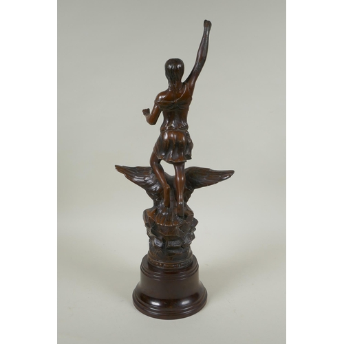 272 - A spelter figure of a lady on the back of an eagle titled Night, on a Bakelite socle, 44cm high