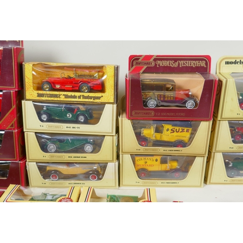 275 - A quantity of assorted diecast model cars and trucks to include Matchbox Models of Yesteryear, Lledo... 