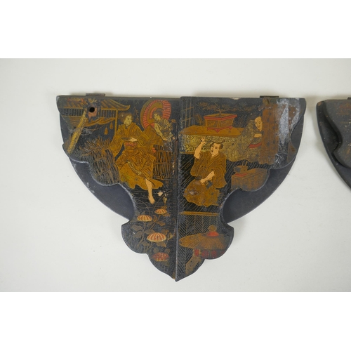 277 - A pair of Japanese export Japanned papier mache folding brackets, decorated with geisha and their pa... 