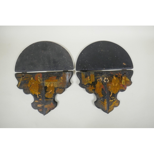 277 - A pair of Japanese export Japanned papier mache folding brackets, decorated with geisha and their pa... 