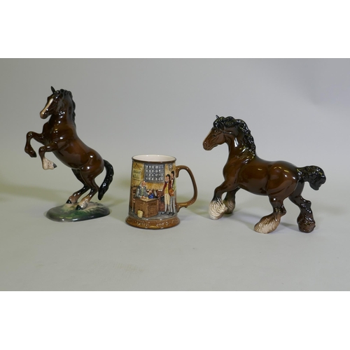 31 - A Beswick figure of a leaping horse, No 1014, another of a cart horse, and a Beswick /Royal Doulton ... 