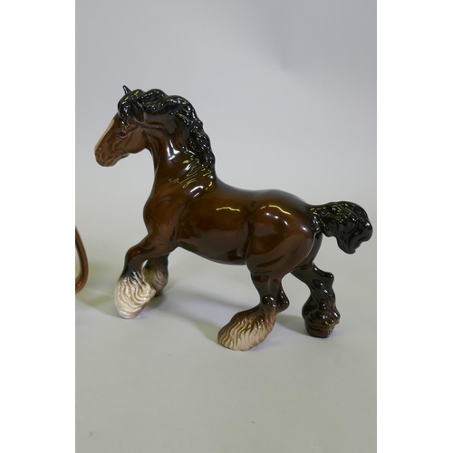 31 - A Beswick figure of a leaping horse, No 1014, another of a cart horse, and a Beswick /Royal Doulton ... 