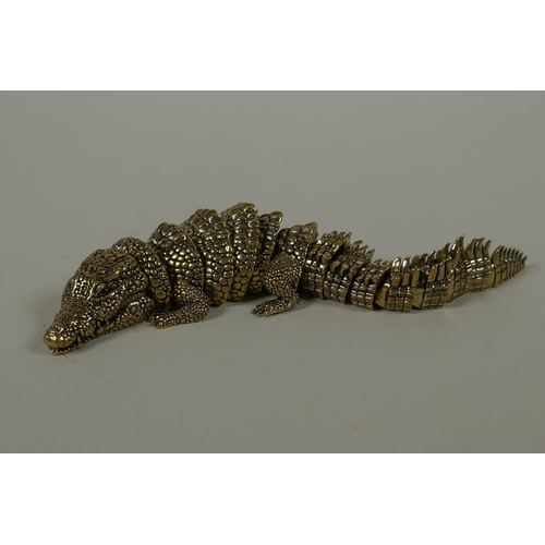 35 - A Japanese Jizai style bronze okimono crocodile with articulated body and legs, 20cm long