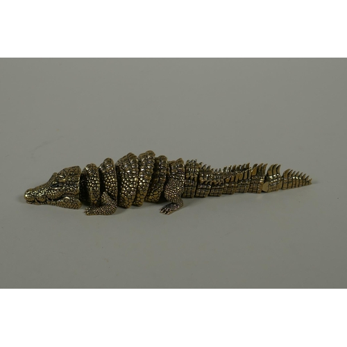 35 - A Japanese Jizai style bronze okimono crocodile with articulated body and legs, 20cm long