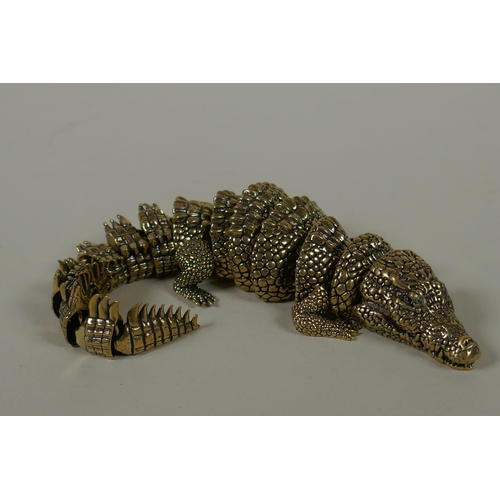 35 - A Japanese Jizai style bronze okimono crocodile with articulated body and legs, 20cm long