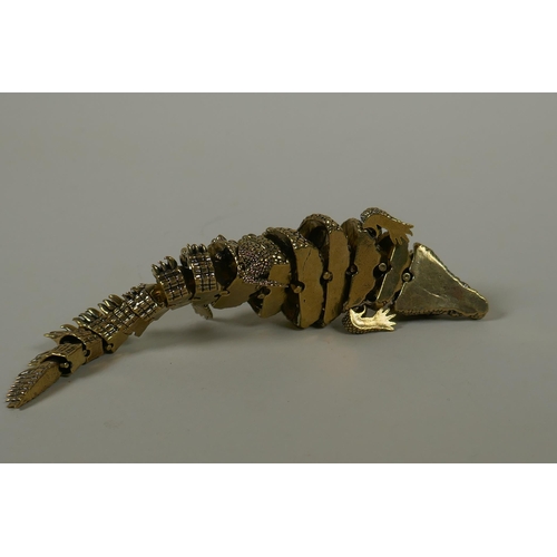 35 - A Japanese Jizai style bronze okimono crocodile with articulated body and legs, 20cm long