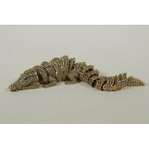 35 - A Japanese Jizai style bronze okimono crocodile with articulated body and legs, 20cm long