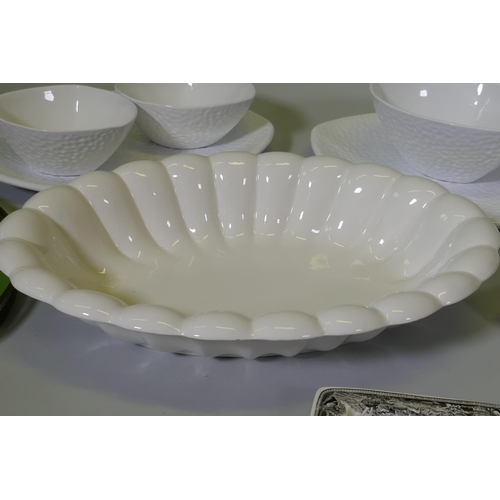 52 - A large Italian Bassano fluted bowl, serving platters and bowls, a Villeroy & Boch serving dish ... 