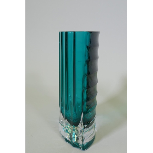 54 - A studio glass vase with ribbed and reeded decoration, 20cm high, three vases and a bowl