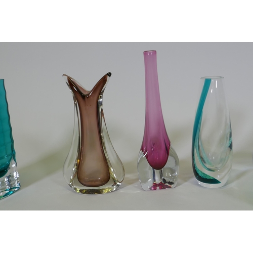 54 - A studio glass vase with ribbed and reeded decoration, 20cm high, three vases and a bowl