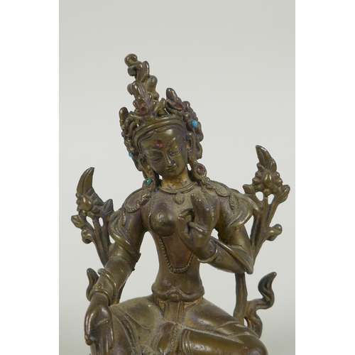 58 - A Tibetan bronze figure of Green Tara with inset turquoise beads, inscription verso, 12cm high