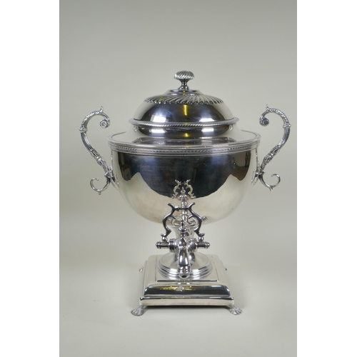 602 - A fine Victorian silver plated samovar/tea urn, with two handles and paw feet, the cover interior in... 