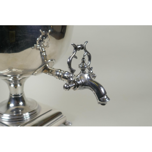 602 - A fine Victorian silver plated samovar/tea urn, with two handles and paw feet, the cover interior in... 