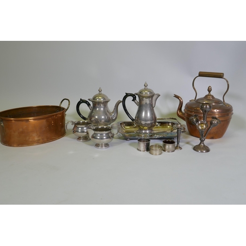 611 - A four piece silver plated tea service, quantity of silver plate, a hallmarked silver epergne, napki... 