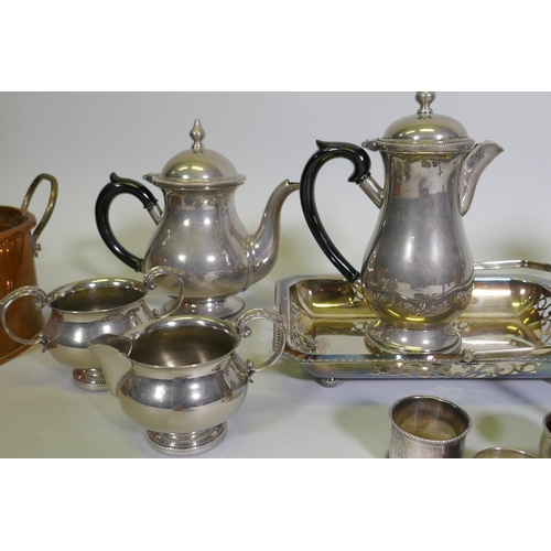 611 - A four piece silver plated tea service, quantity of silver plate, a hallmarked silver epergne, napki... 