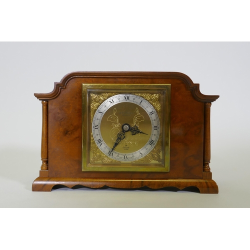 612 - A walnut cased Elliott mantel clock, inscribed G.W. Benson, London, with silvered chapter ring and b... 