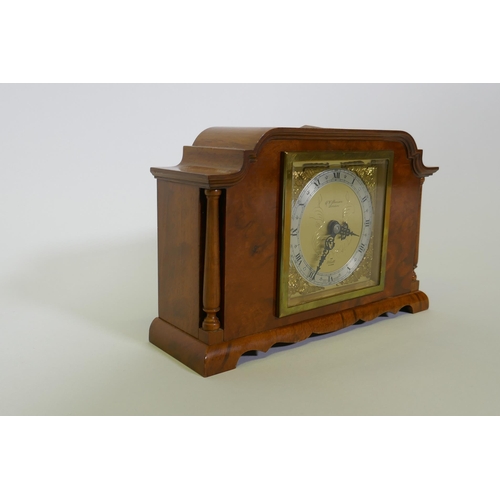 612 - A walnut cased Elliott mantel clock, inscribed G.W. Benson, London, with silvered chapter ring and b... 