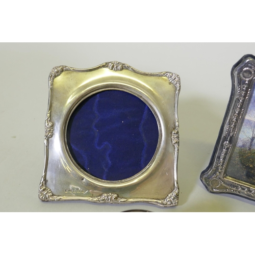 613 - Three miniature silver photo frames with monogram crests, aperture 3.5cm diameter, and three others