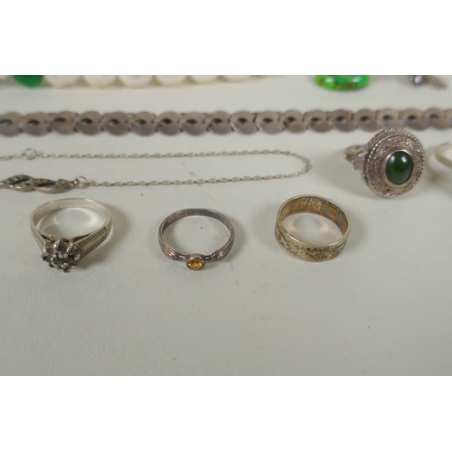 617 - A quantity of vintage silver costume jewellery to include rings, charms, bangles etc, mostly all sil... 