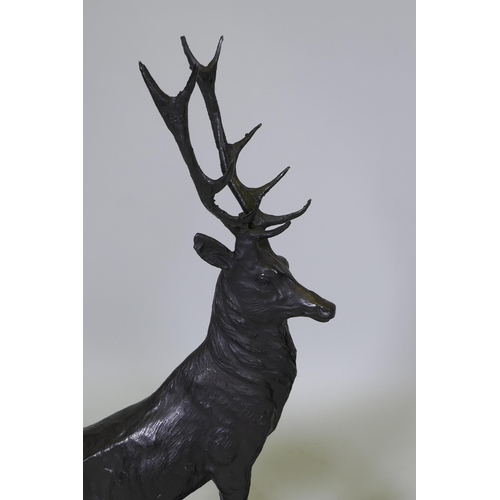 62 - After Jules Moigniez (French, 1835-1894), a pair of twelve point bronze stags, on marble bases, sign... 