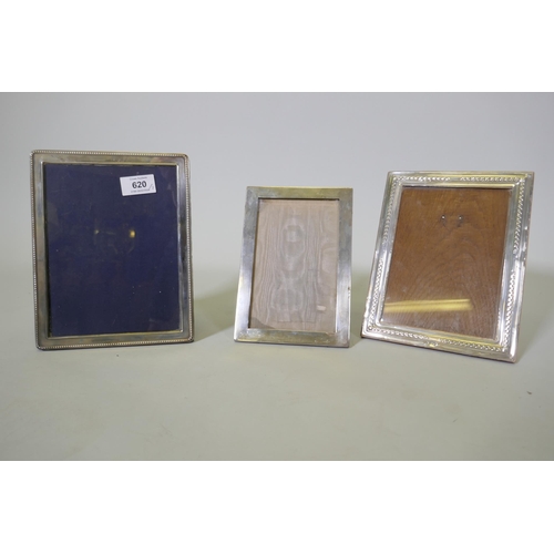 620 - Three hallmarked silver photo frames, largest aperture 14.5 x 19.5cm