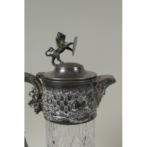 621 - An antique silver plated and cut glass claret jug with a rampant lion knop, and a Walker and Hall si... 