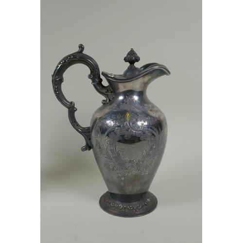 621 - An antique silver plated and cut glass claret jug with a rampant lion knop, and a Walker and Hall si... 