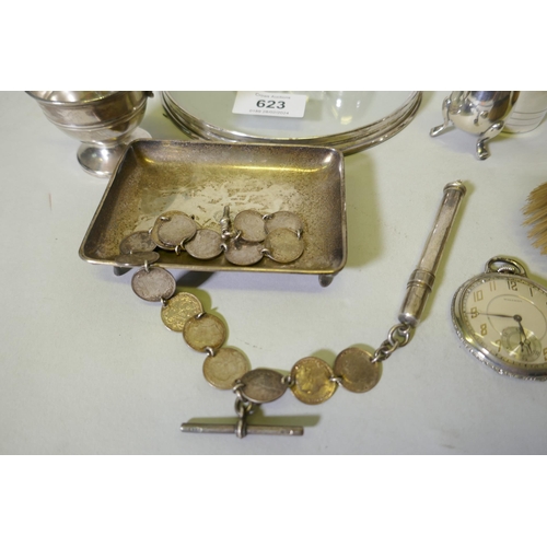 623 - A hallmarked silver pin tray, cups and beaker and cut glass coaster with silver mount, 16cm diameter... 