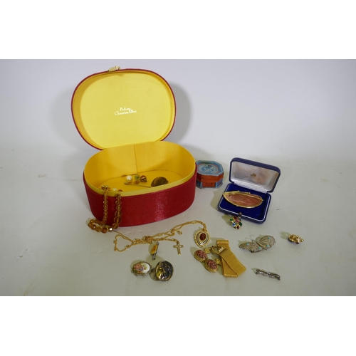 651 - A quantity of costume jewellery in a Christian Dior presentation box, 21 x 16 x 11cm