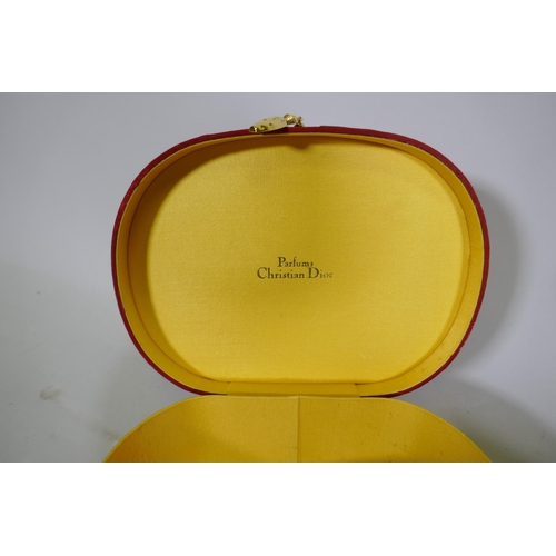 651 - A quantity of costume jewellery in a Christian Dior presentation box, 21 x 16 x 11cm